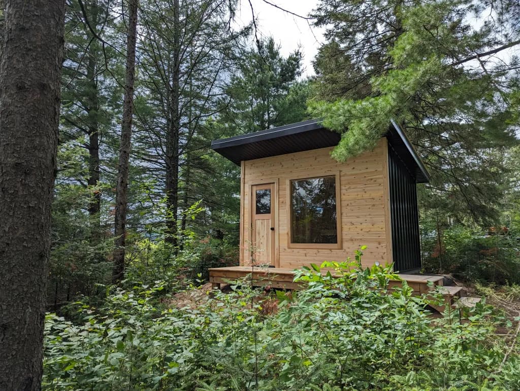Sauna with custom deck and lake view